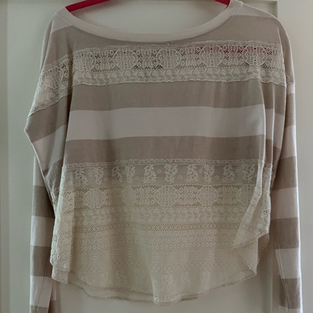 “We The Free” long-sleeve cream top with lace. Size XS.